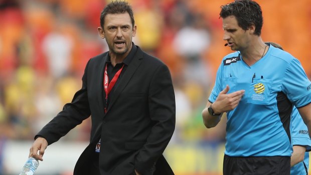 Tough times: Tony Popovic challenging referee Kris Griffiths-Jones after the Wanderers' defeat to Central Coast. 