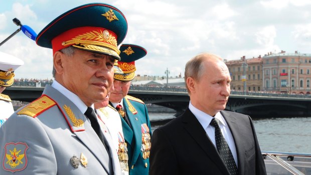 Russian President Vladimir Putin, right, and Defence Minister Sergei Shoigu in St Petersburg earlier this year.
