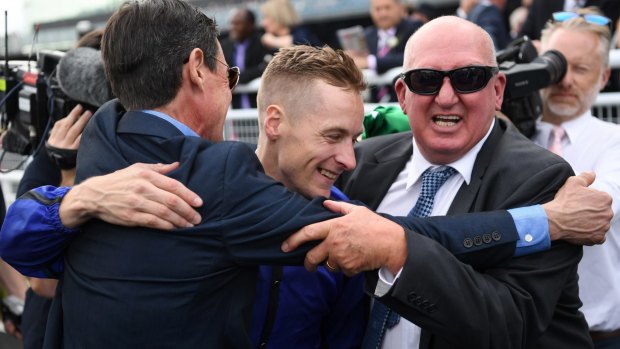 Popular moment: Jockey Blake Shinn celebrates with Pat Webster after winning the Epsom Handicap at Randwick.