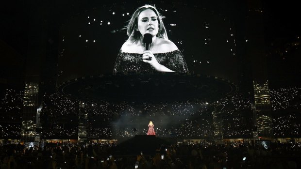 Adele felt compelled to point out her big-screen image had some flattering filters on it.