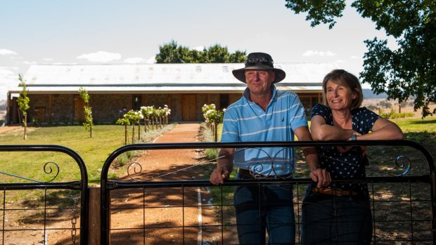 Scott and Melinda Medway near the old stables they have restored which will open as a restaurant near Gunning.