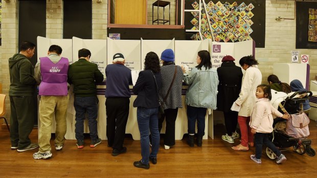 People cast their vote at Cabramatta Public School polling station, Cabramatta.