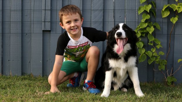 ADHD sufferer Jesse Burgess and his dog River, who helps him deal with the disorder. 