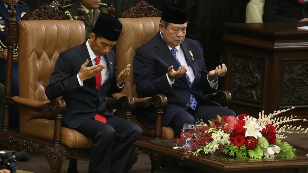 Handover: Incoming Indonesian President Joko Widodo and outgoing President Susilo Bambang Yudhoyono.