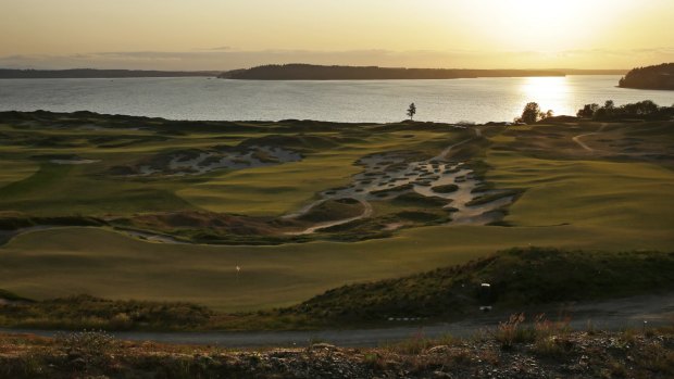 House of pain: Chambers Bay, which is serene at sunset, will test the world best golfers in this week's US Open.