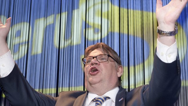 Finns Party leader Timo Soini celebrates after the party won 38 seats on Sunday.