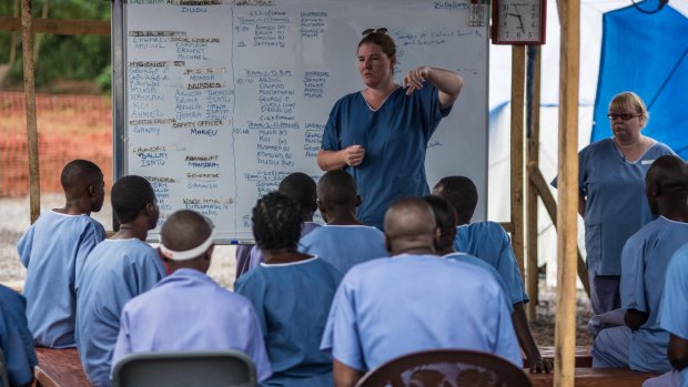 Amanda McClelland working in an Ebola affected area in a Red Cross field hospital in Kenema, Sierra Leone.