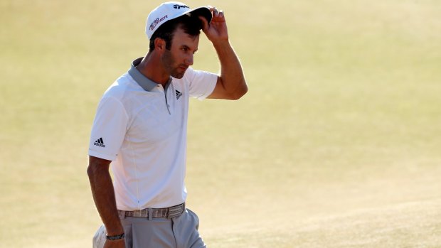 Dustin Johnson's 12-foot putt on the final hole missed the cup, costing him the tournament.