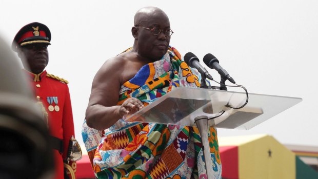 Ghana's chief justice swore in the nation's newly elected President Nana Akufo-Addo amid a sea of people dressed in the red, blue and white colours.
