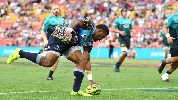 One of the Tahs' best: Naiyaravoro dots down against the Hurricanes.