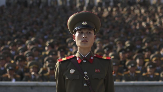 A soldier stands to attention during a parade in the North Korean capital, Pyongyang.