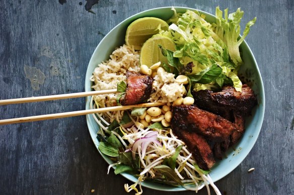 Black pepper and kaffir lime beef bowl with coconut rice and salad.