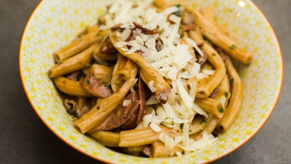 Macaroni with salami and mushroom ragu.