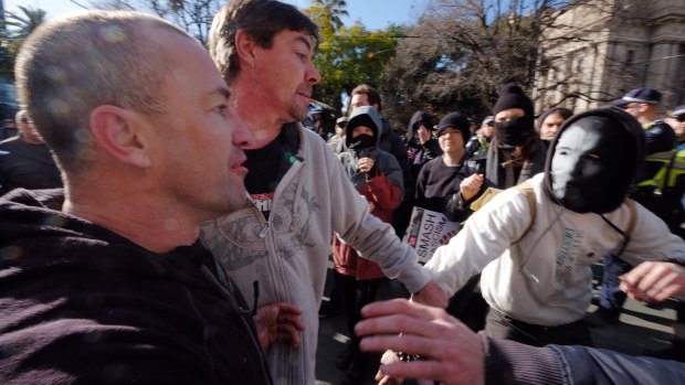 Reclaim Australia protesters clash with opposition protesters in Melbourne.