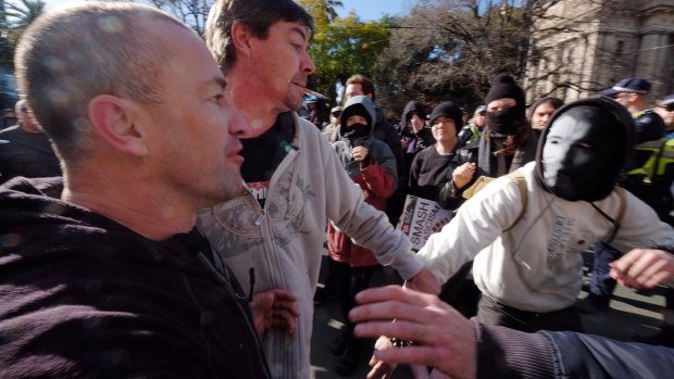 Reclaim Australia protesters clash with opposition protesters in Melbourne.