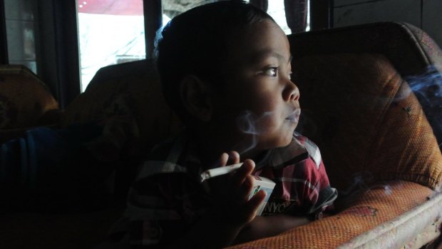 Muhammad Dihan Awalidan, 4, is part of Indonesia's smoking epidemic.