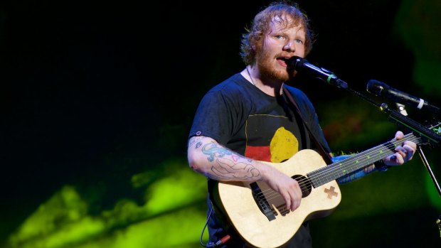 Yet to respond to Photograph allegation ... Ed Sheeran in concert at Allianz Stadium.