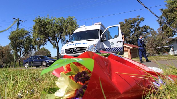 Floral tributes at the scene of the Lalor Park murders.