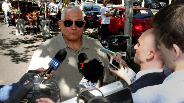 Gatto answers media questions about in Lygon Street on Thursday.