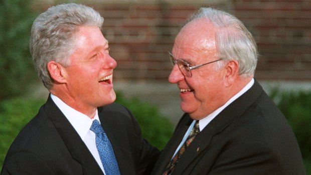 US President Clinton welcomes German Chancellor Helmut Kohl to a dinner at the University of Denver in 1997.