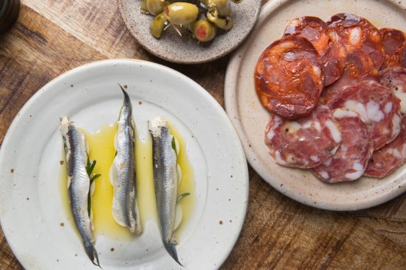 Stuffed olives, charcuterie and white anchovies at Harvest.