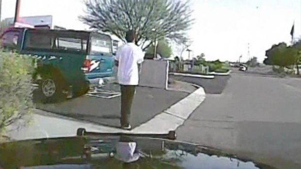 A dashcam still moments before a police officer uses his cruiser to ram the armed suspect, Mario Valencia on February 19.