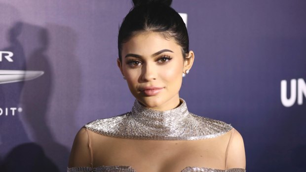 Kylie Jenner caused mayhem when she went along as the date of a teenager in Sacramento, California. 