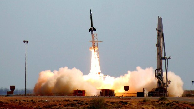 The University of Queensland's "HyShot", a hypersonic "scramjet", blasts off from its launch pad at Woomera.