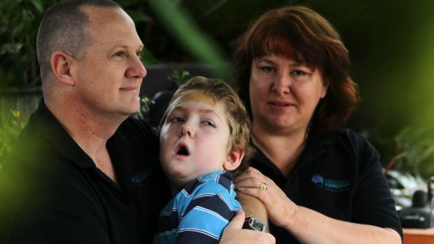 Michael and Jo-Ann Morris with Samuel, aged 7. Samuel was left disabled after a non-fatal drowning in the family pool in 2006 resulted in serious brain injuries. He died in 2014.