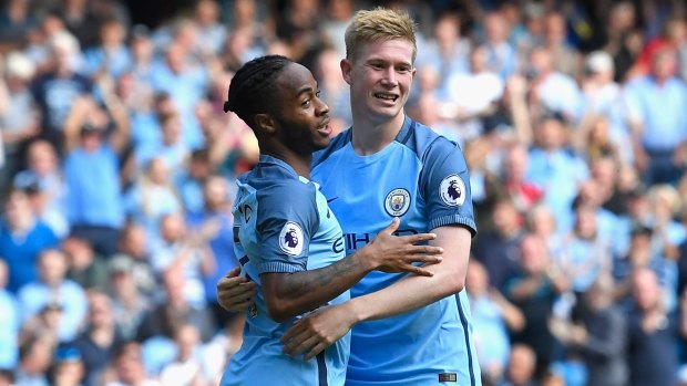 Guardiola's weapons: Raheem Sterling and Kevin de Bruyne ran riot against Bournemouth.