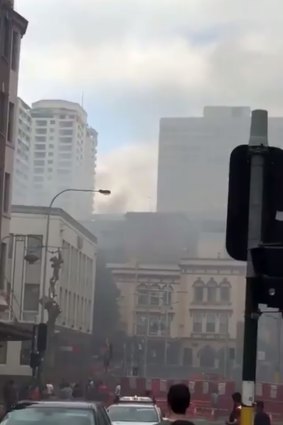 Three people were taken to hospital for smoke inhalation.