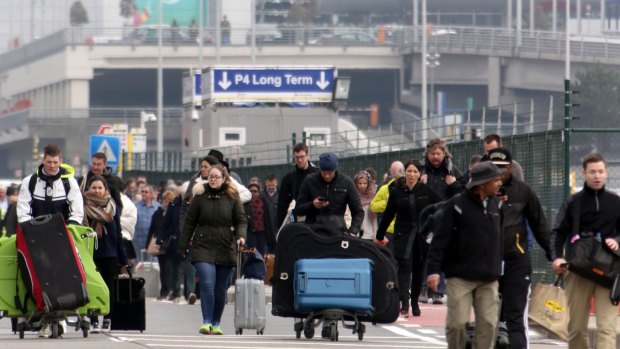 Passengers are evacuated from Zaventem Bruxelles International Airport after a terrorist attack on March 22 in Brussels.