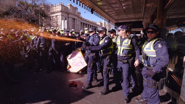 Police used pepper spray at the Melbourne protest.