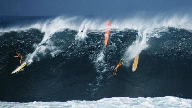 Greg Noll surfing Waimea in 1960.