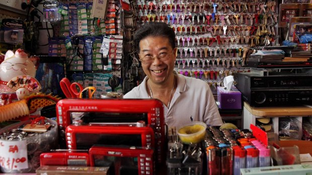 Jacky gets ready to tackle the New Year rush. He's run the Shun Fai Modern AV Co in Sussex Street for the past 25 years.