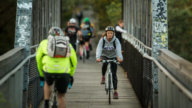 Cyclists on the bridge at Walmer Street.