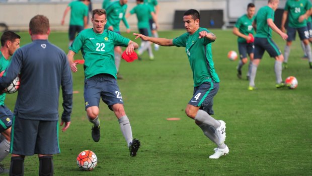 Open to an A-League return: Socceroos defender Alex Wilkinson (left) is looking for a new club.