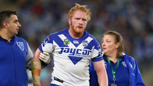 Canterbury captain James Graham leaves the field after being knocked out.