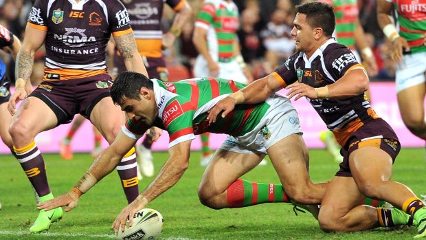 Gallant effort: Bryson Goodwin goes over for Souths.