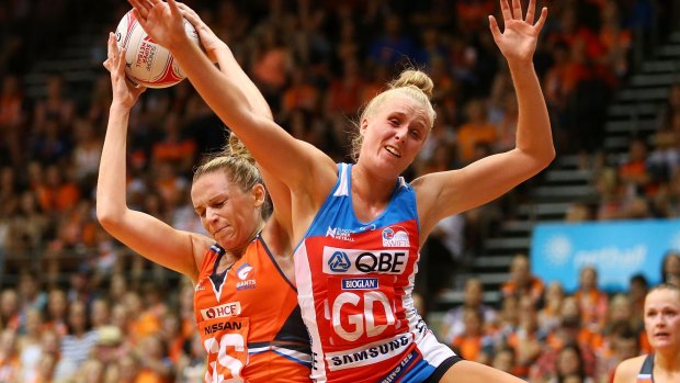 Super start: Jo Harten of the Giants and Maddy Turner of the Swifts contest possession.