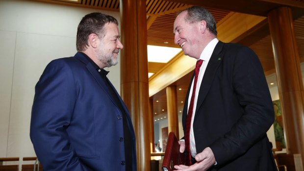 Corridors of power: Russell Crowe meeting Barnaby Joyce at Parliament House in May.