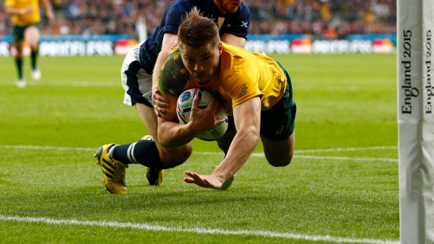 LONDON, ENGLAND - OCTOBER 18:  Drew Mitchell of Australia scores his teams fourth try during the 2015 Rugby World Cup Quarter Final match between Australia and Scotland at Twickenham Stadium on October 18, 2015 in London, United Kingdom.  (Photo by Dan Mullan/Getty Images)