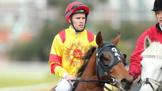 Jockey Tommy Berry rides Thronum to win race the TAB Rewards Handicap at Randwick this month.