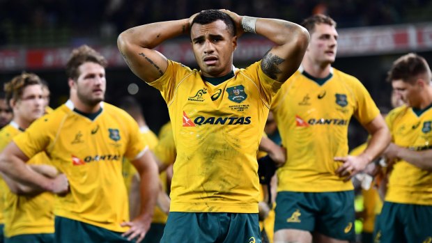 Dejected: Will Genia takes in the Wallabies' missed opportunity.