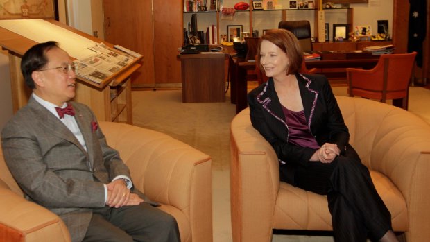 Prime Minister Julia Gillard in her office with Mr Tsang in 2011. 
