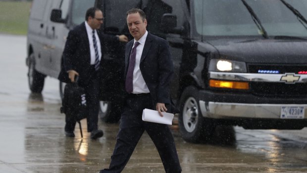 White House Chief of Staff Reince Priebus walks to boards Air Force One on Friday.