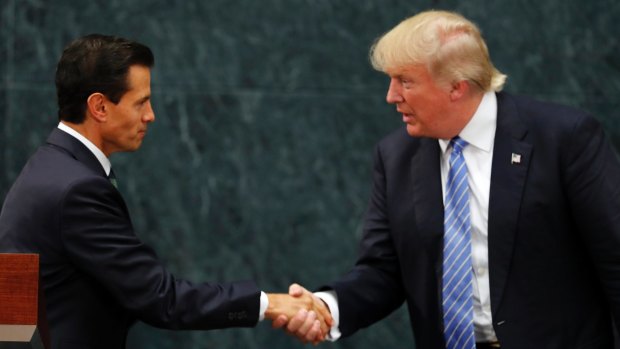 Looking presidential: Mexico President Enrique Pena Nieto and Donald Trump shake hands. 