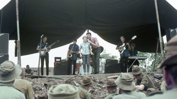 Little Pattie on stage with Col Joye and the Joye Boys at Nui Dat, Vietnam, 1966
