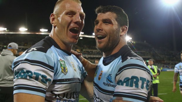 Experienced pair: Luke Lewis and Michael Ennis celebrate the win.