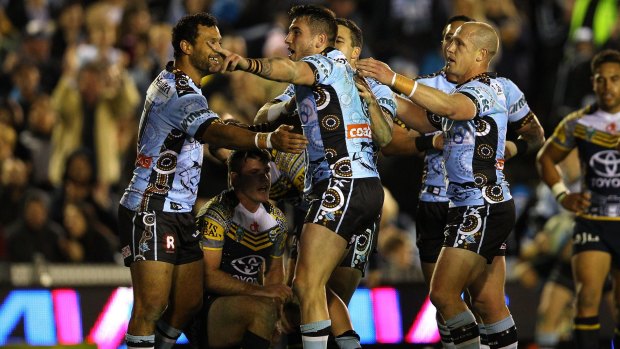 Gunning for glory: Jack Bird celebrates his try in the first half of the 301-8 win.